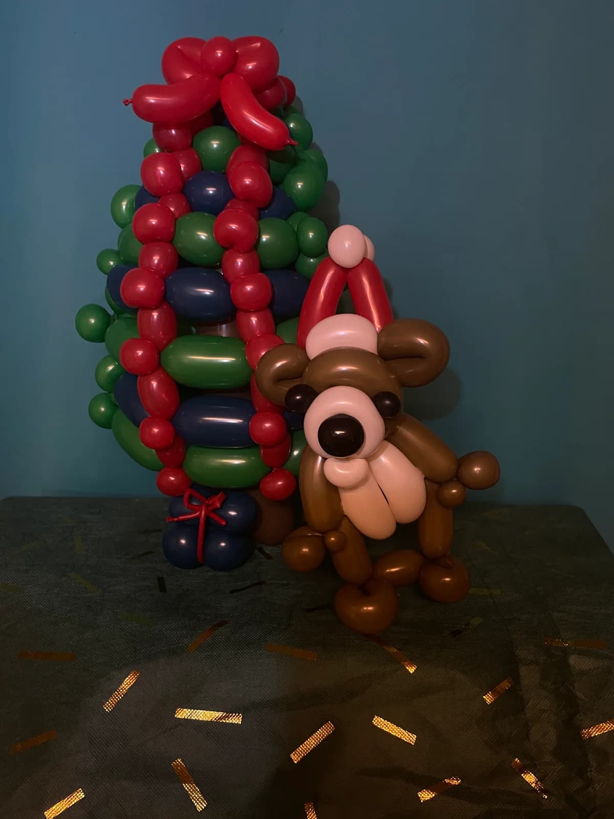 Balloon Christmas tree with a festive reindeer